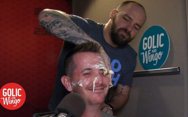 Mike Golic Jr. smashes cake on Jason Fitz’s face during his last day on Golic and Wingo